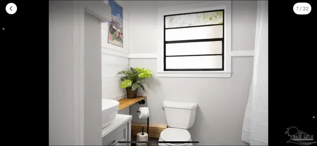 a kitchen with stainless steel appliances a refrigerator and microwave