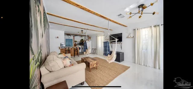 front view of a house with a large window