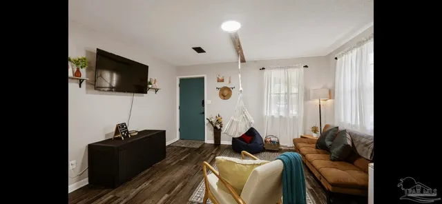 a view of storage and utility room with washer and dryer