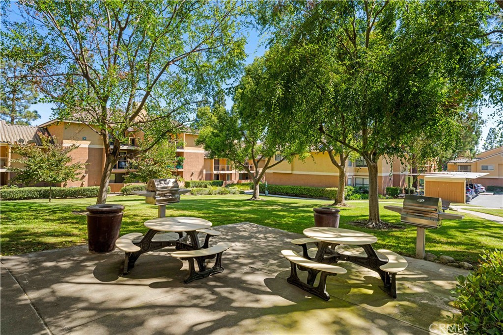 10655 Lemon Avenue, Unit 1710 Rancho Cucamonga, CA 91737 - Photo 12 of 13 a view of a park with large trees