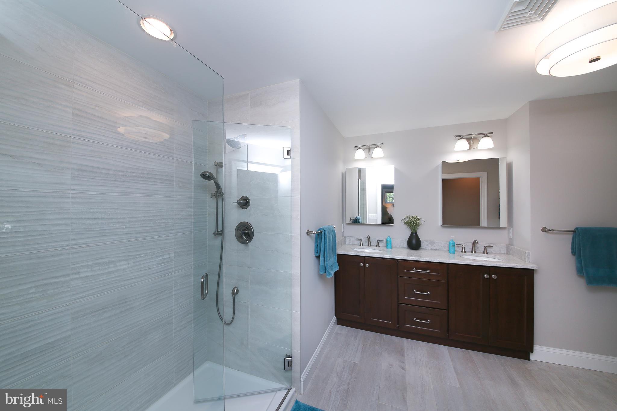 111 Gallagher Road Wayne, PA 19087 - Photo 17 of 31 Primary ensuite bath with tiled shower