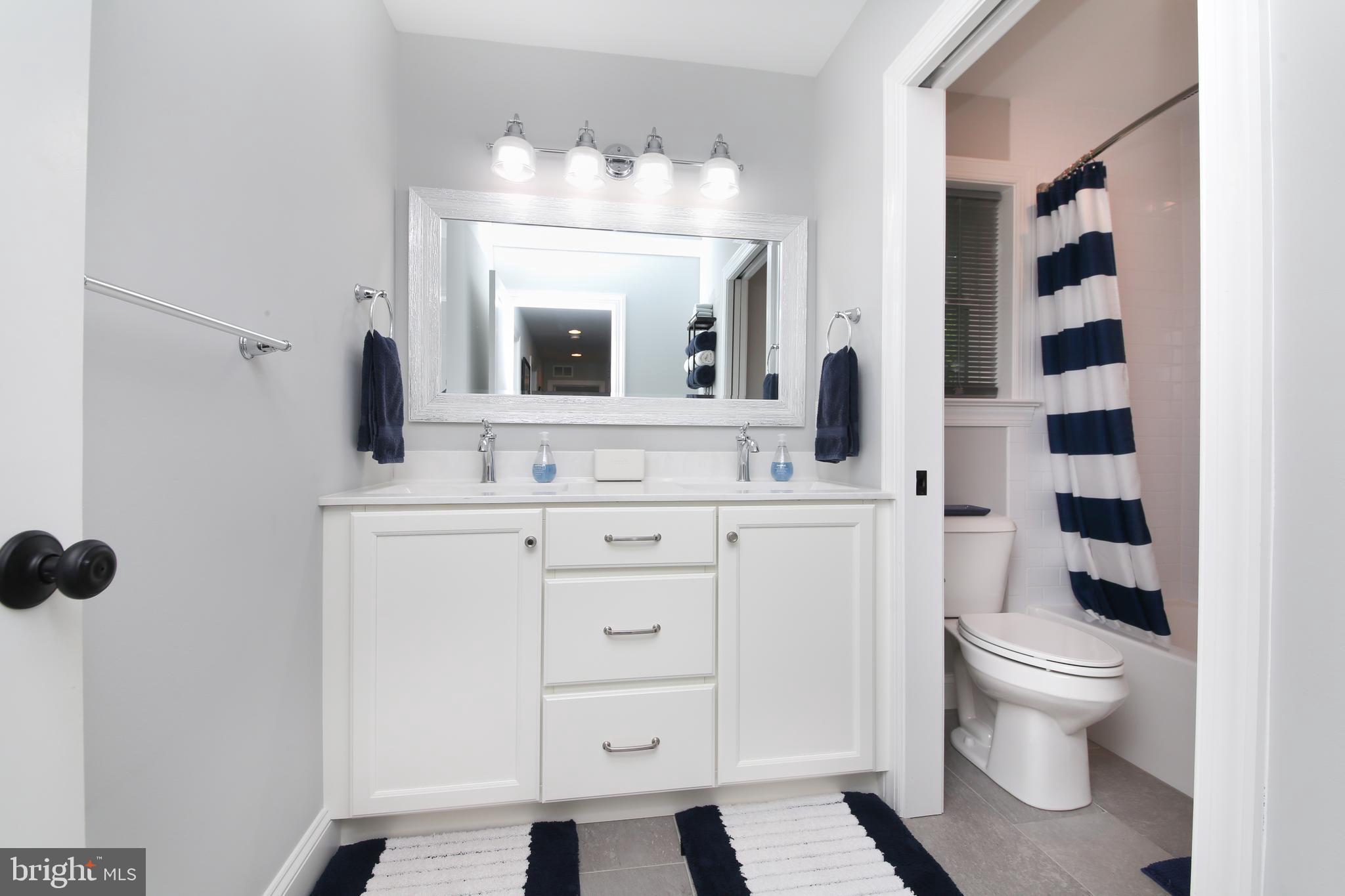111 Gallagher Road Wayne, PA 19087 - Photo 25 of 31 Hall bath with 2-sink vanity