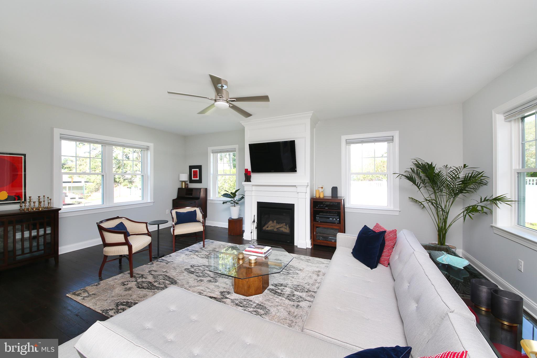 111 Gallagher Road Wayne, PA 19087 - Photo 6 of 31 Living room w/ gas fireplace and classic millwork