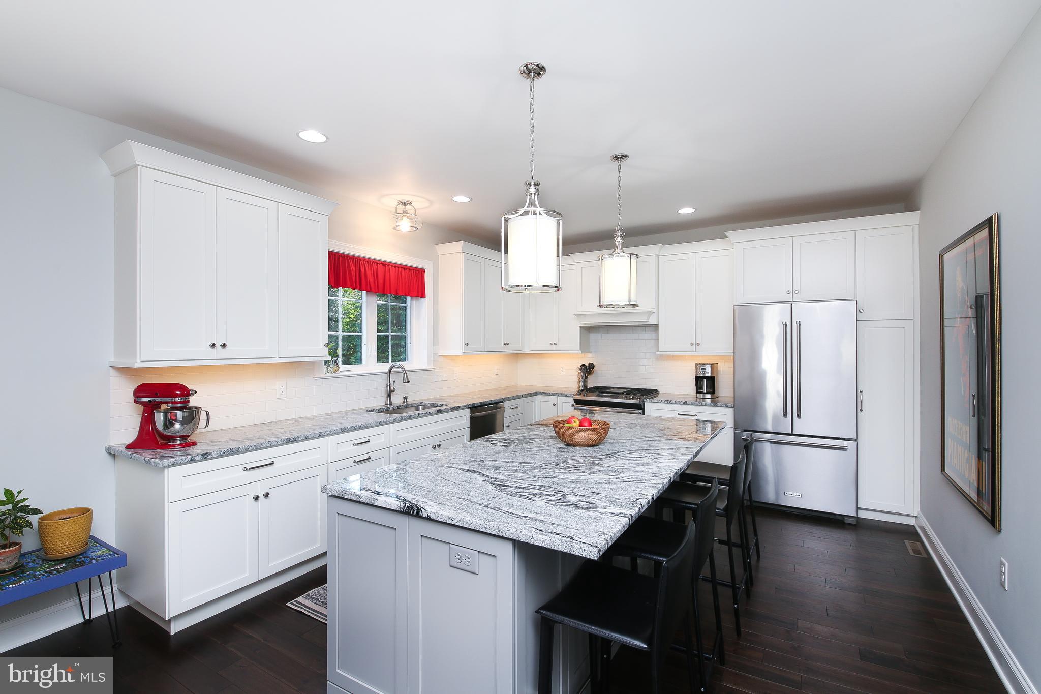 111 Gallagher Road Wayne, PA 19087 - Photo 8 of 31 Kitchen has white cabinets & stainless appliances