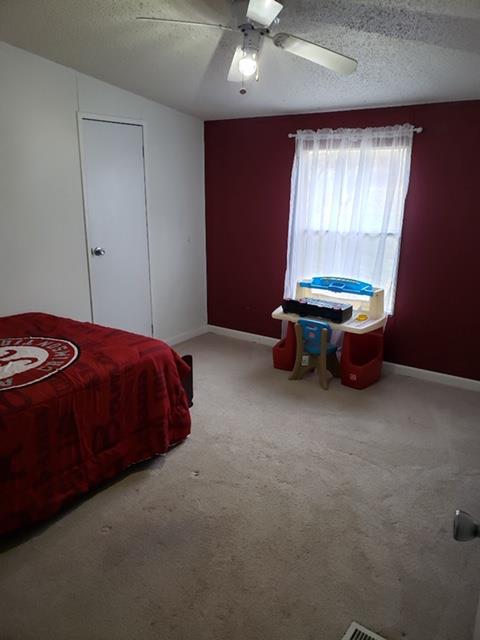 4305 Chicken Road Lebanon, TN 37090 - Photo 12 of 28 a bedroom with a bed and a window