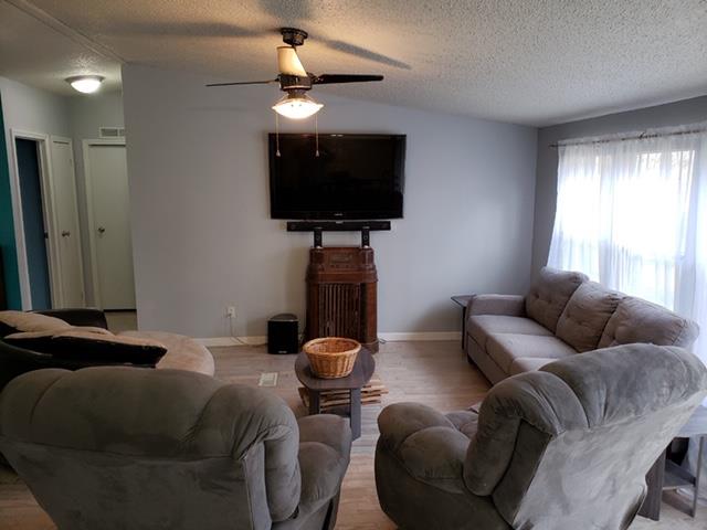 4305 Chicken Road Lebanon, TN 37090 - Photo 3 of 28 a living room with furniture and a flat screen tv