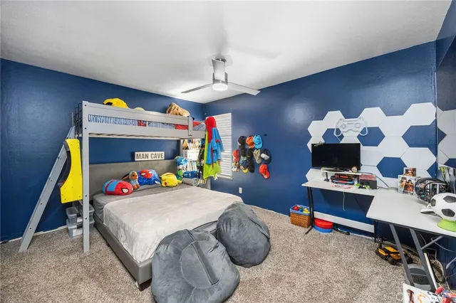 a bedroom with a bed and a bed