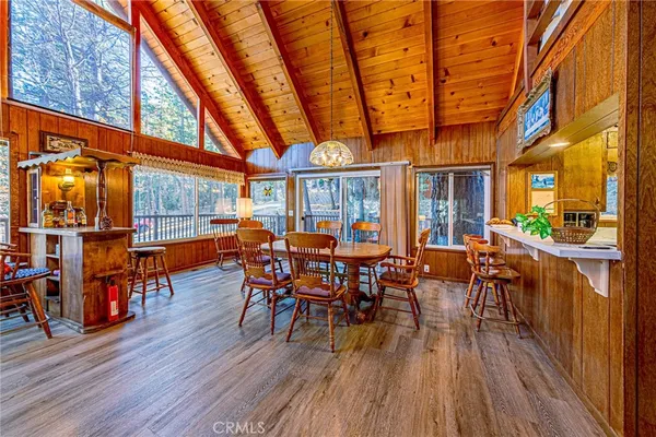 a view of a patio with a table and chairs