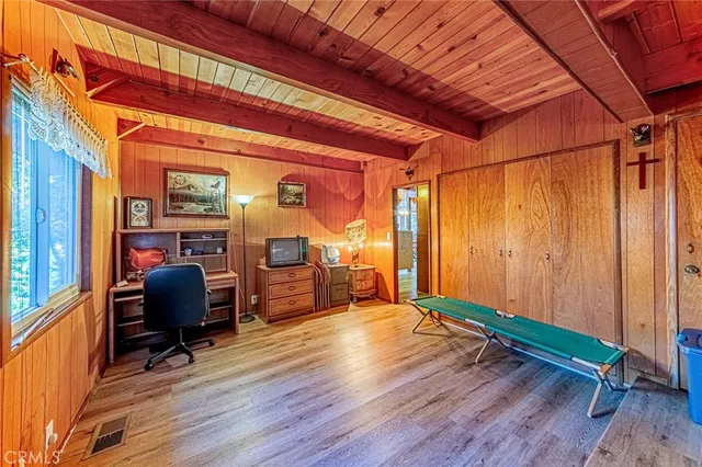 a bathroom with a sink mirror vanity and toilet