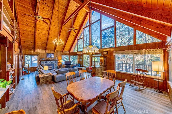 a outdoor living space with patio furniture and wooden floor