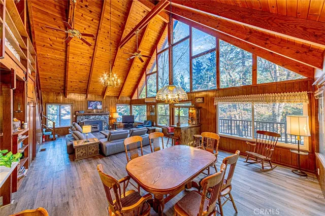 a outdoor living space with patio furniture and wooden floor