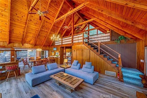 a bed room with a bed and a chair