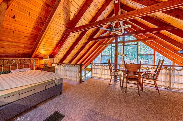 a backyard of a house with outdoor seating