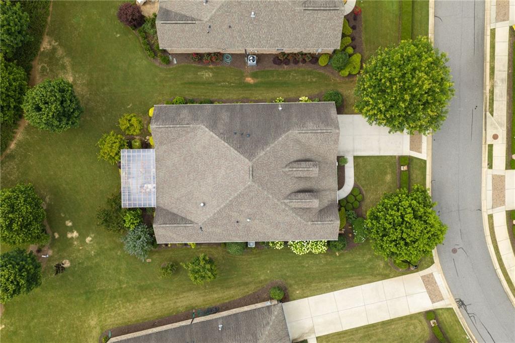 4735 Amble Trace Cumming, GA 30040 - Photo 64 of 73 an aerial view of a house with a yard