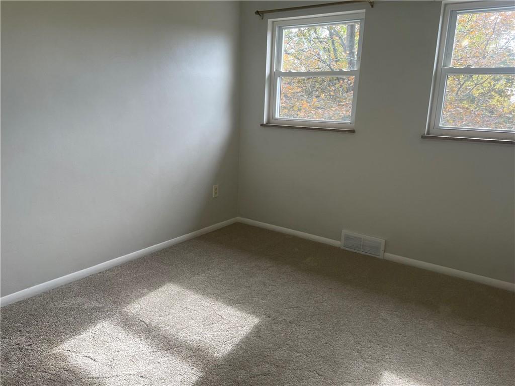 130 Bradys Ridge Road Beaver, PA 15009 - Photo 11 of 22 an empty room with a window