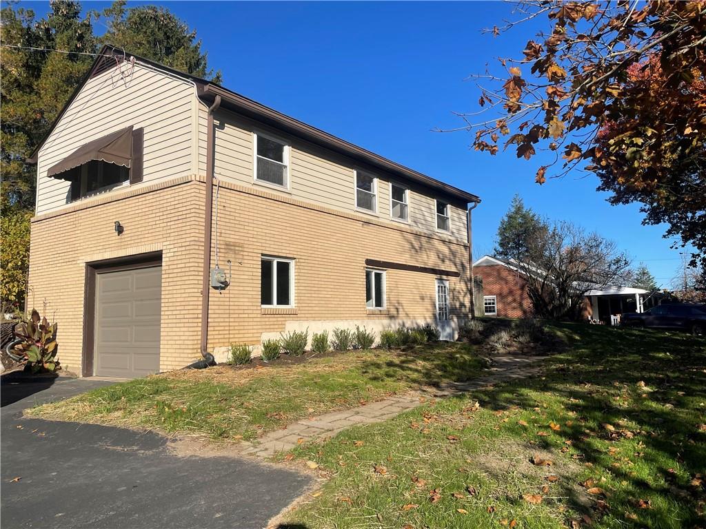 130 Bradys Ridge Road Beaver, PA 15009 - Photo 17 of 22 a front view of a house with a yard