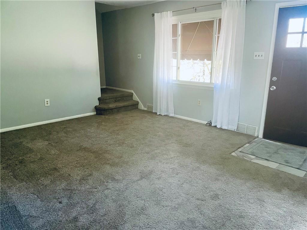 130 Bradys Ridge Road Beaver, PA 15009 - Photo 3 of 22 an empty room with windows