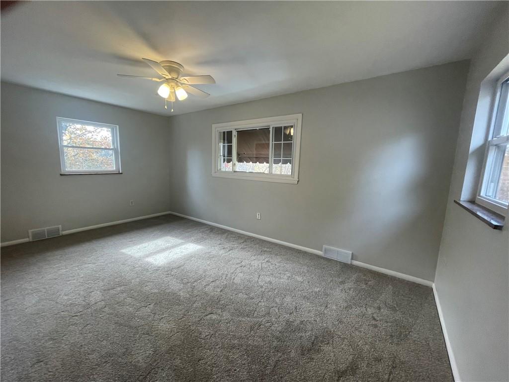 130 Bradys Ridge Road Beaver, PA 15009 - Photo 8 of 22 a view of an empty room with a window