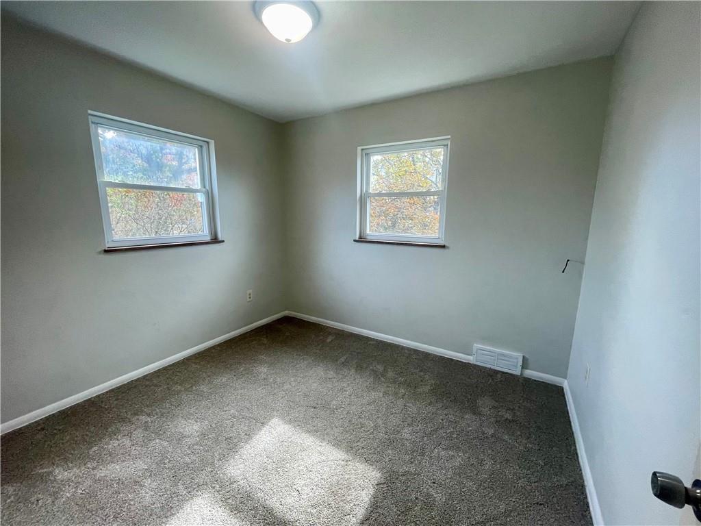 130 Bradys Ridge Road Beaver, PA 15009 - Photo 9 of 22 an empty room with a window
