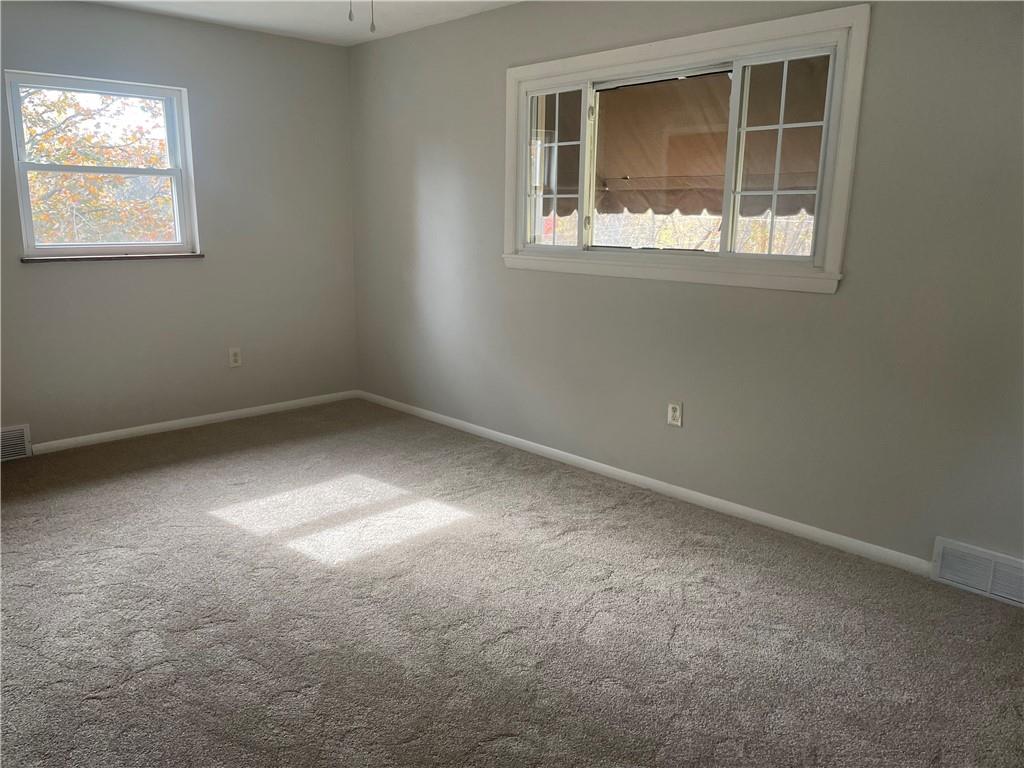 130 Bradys Ridge Road Beaver, PA 15009 - Photo 10 of 22 an empty room with a window