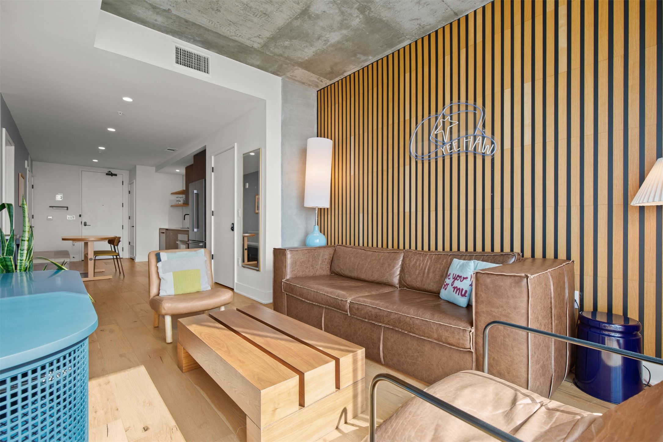 48 East Avenue, Unit 2807 Austin, TX 78701 - Photo 11 of 23 The gorgeous accent wall serves as a statement piece, infusing the room with personality and a hint of artistic flair