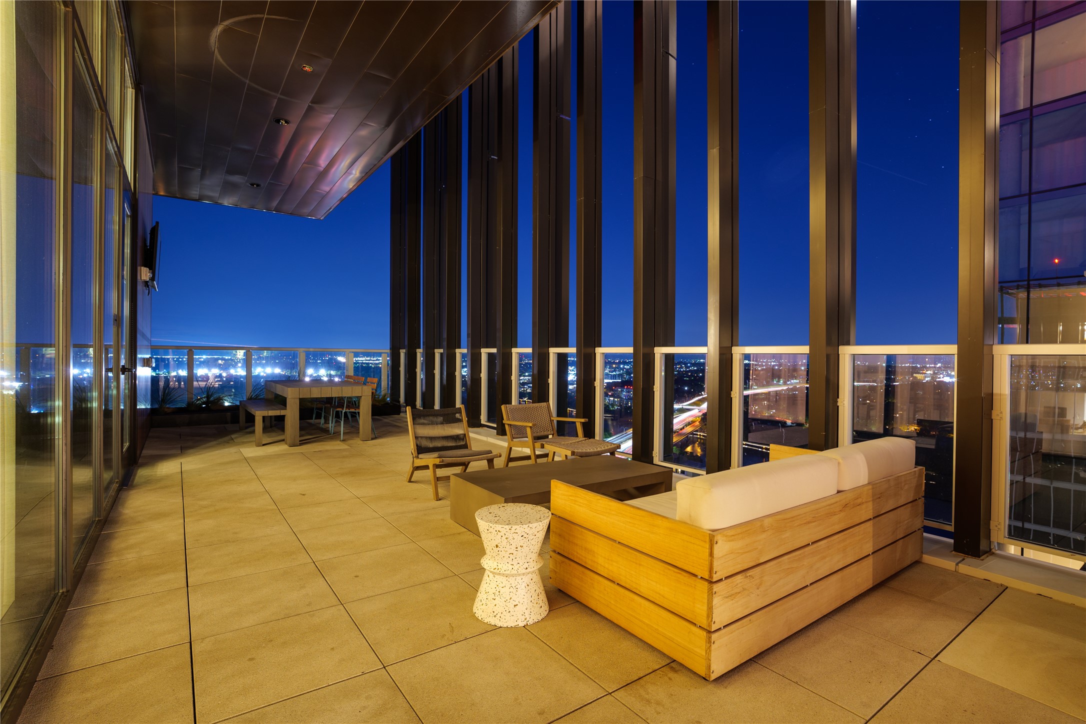 48 East Avenue, Unit 2807 Austin, TX 78701 - Photo 22 of 23 The community rooftop featuring an outdoor lounge area and city views