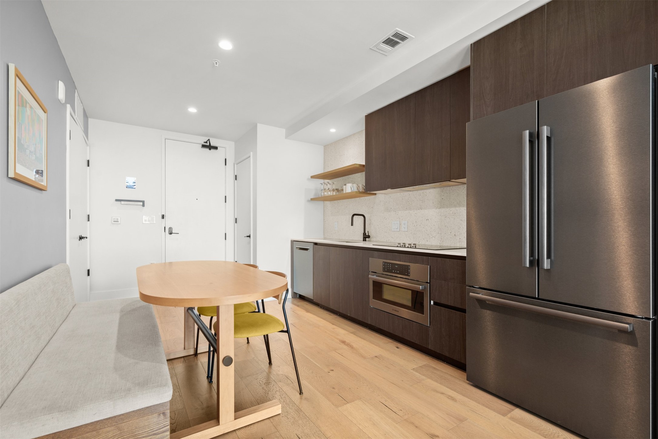 48 East Avenue, Unit 2807 Austin, TX 78701 - Photo 6 of 23 Natural light drenches this space, creating a bright, inviting atmosphere for every meal