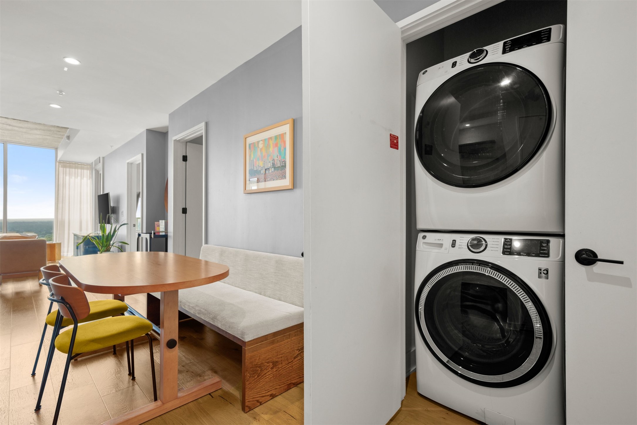 48 East Avenue, Unit 2807 Austin, TX 78701 - Photo 8 of 23 Tucked away in a discreet closet, the stackable washer and dryer offer ultimate convenience without sacrificing valuable space