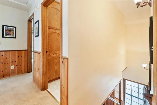 a bed room with a bed and a window