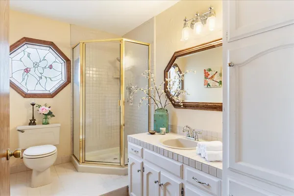 a bed room with a bed and a window