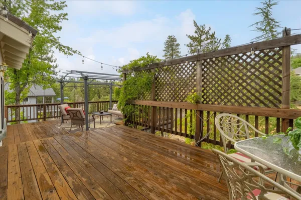 a view of a chairs and table in patio