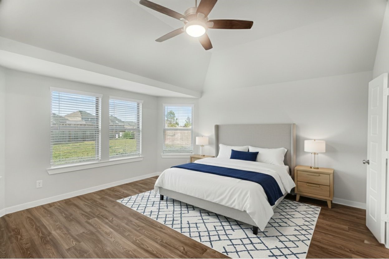 8427 Blue Shell Lane Cypress, TX 77433 - Photo 17 of 27 a bedroom with a large bed and a window