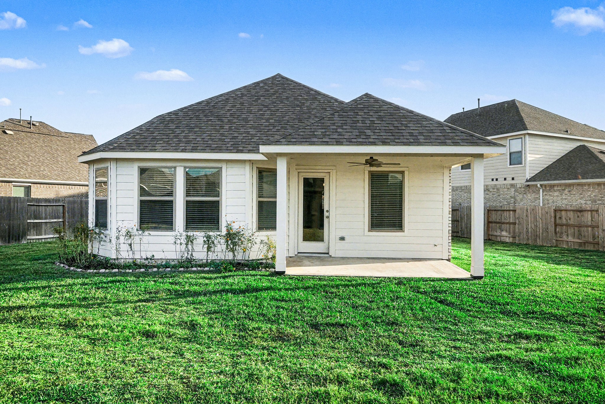 8427 Blue Shell Lane Cypress, TX 77433 - Photo 22 of 27 a front view of a house with a yard