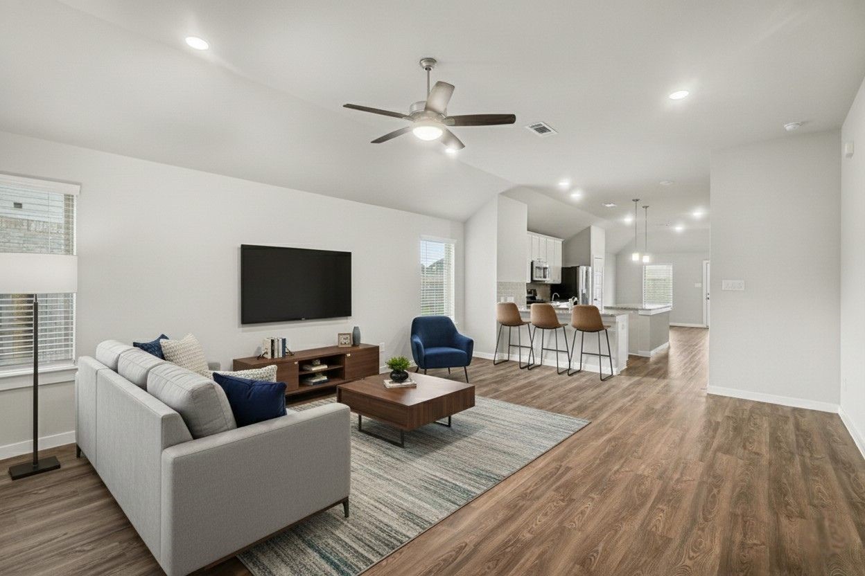 8427 Blue Shell Lane Cypress, TX 77433 - Photo 5 of 27 a living room with furniture and a flat screen tv