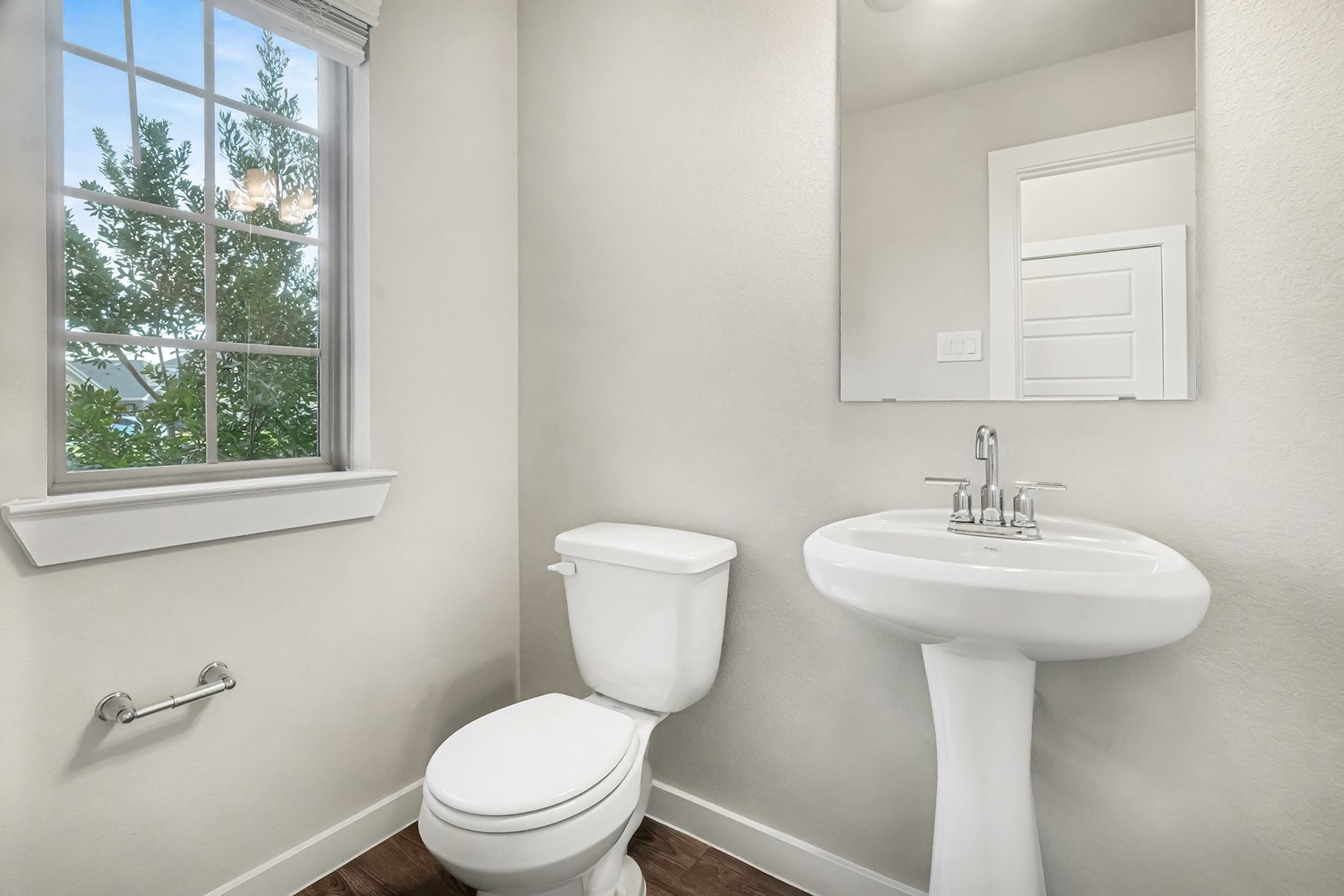 8427 Blue Shell Lane Cypress, TX 77433 - Photo 8 of 27 a bathroom with a toilet sink and mirror
