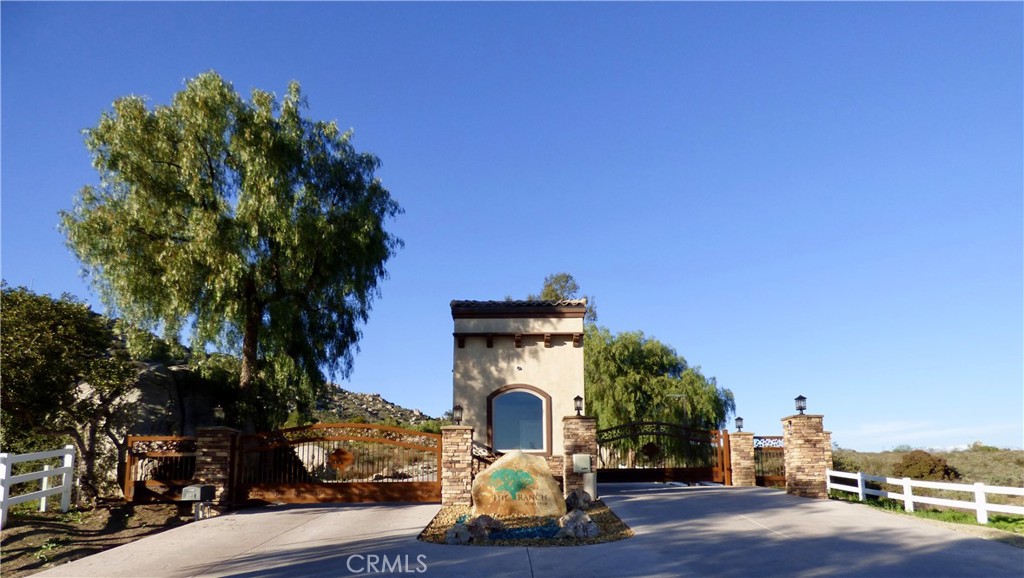 23685 Tapatia Road Homeland, CA 92548 - Photo 16 of 20 a front view of a house with a yard