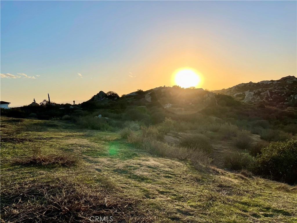 23685 Tapatia Road Homeland, CA 92548 - Photo 2 of 20 a view of a mountain view in middle of a lake