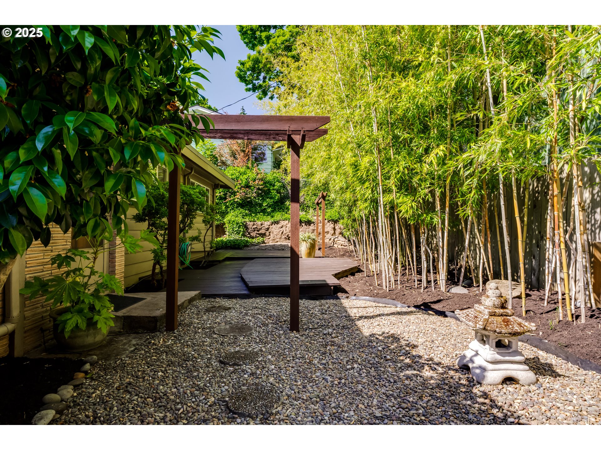 495 West 27th Avenue Eugene, OR 97405 - Photo 34 of 48 a view of a bench in the garden