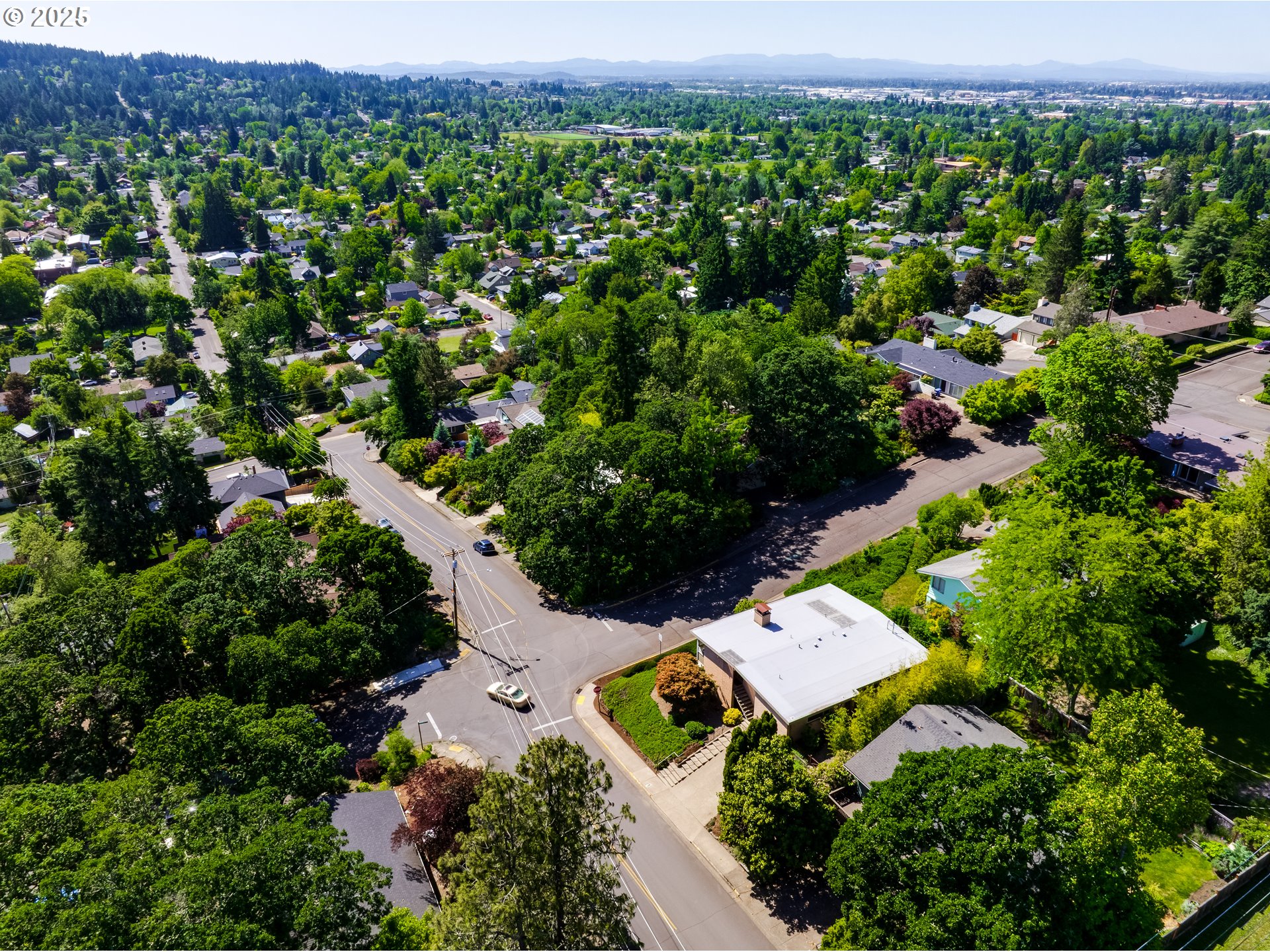 495 West 27th Avenue Eugene, OR 97405 - Photo 46 of 48 an aerial view of a house with a yard