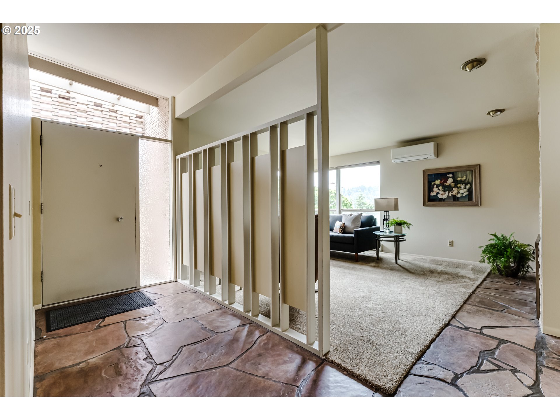 495 West 27th Avenue Eugene, OR 97405 - Photo 5 of 48 a view of a livingroom with furniture and front door