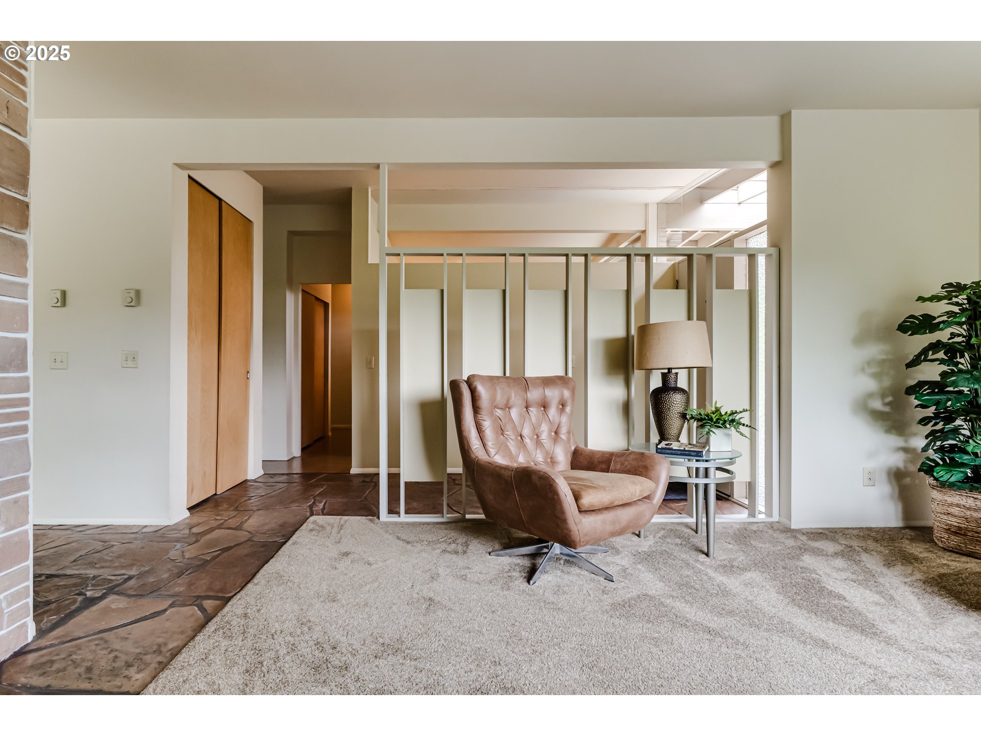 495 West 27th Avenue Eugene, OR 97405 - Photo 6 of 48 a living room with furniture and potted plants
