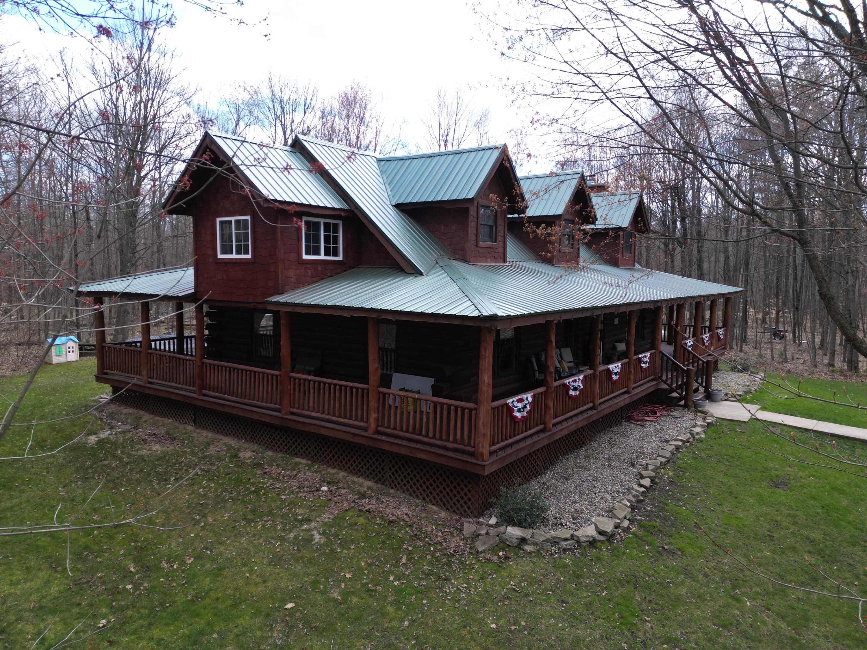 22375 2 Mile Road Morley, MI 49336 - Photo 4 of 28 front Porch