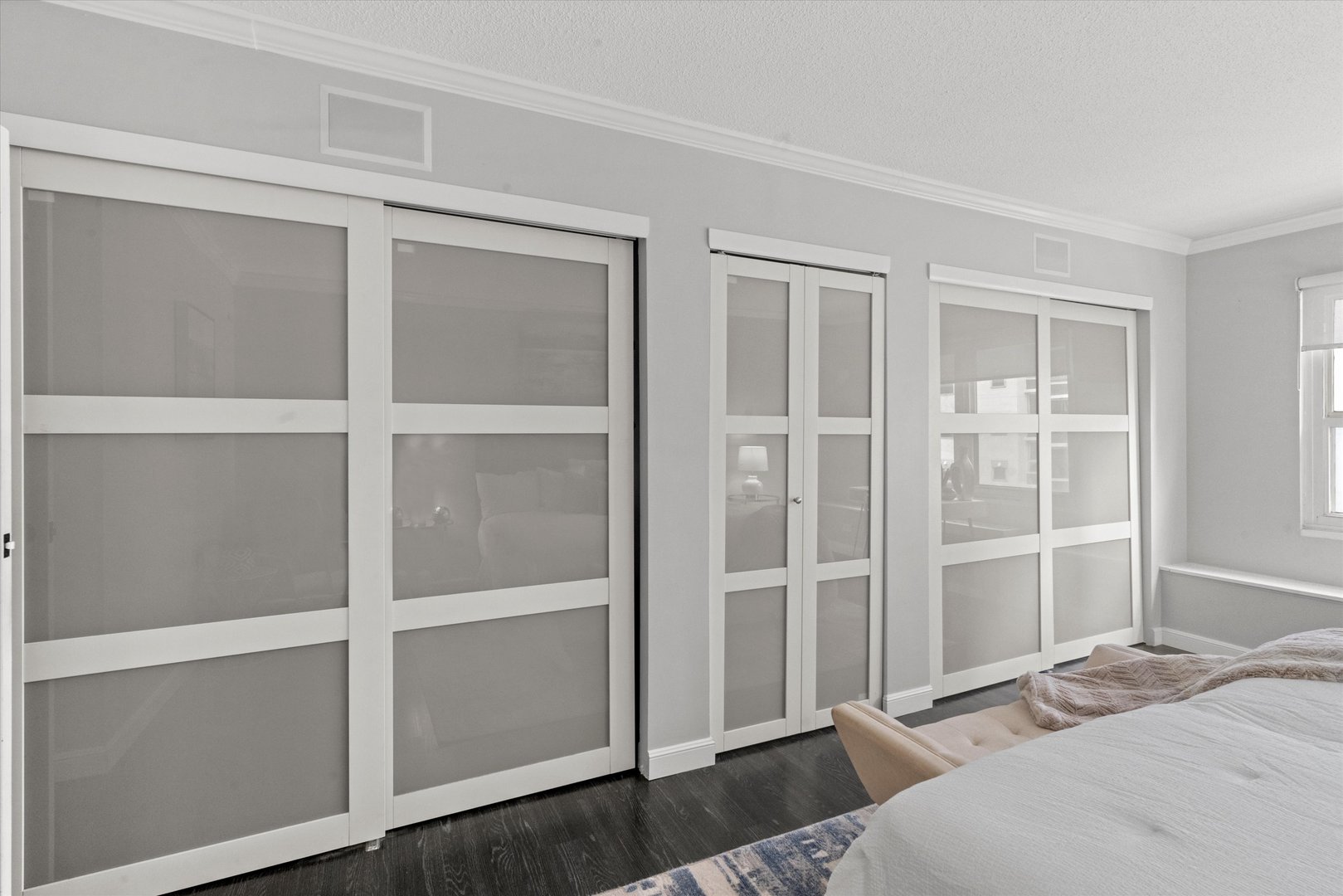 1313 North Ritchie Court, Unit 805 Chicago, IL 60610 - Photo 12 of 21 a bedroom with a bed and a window