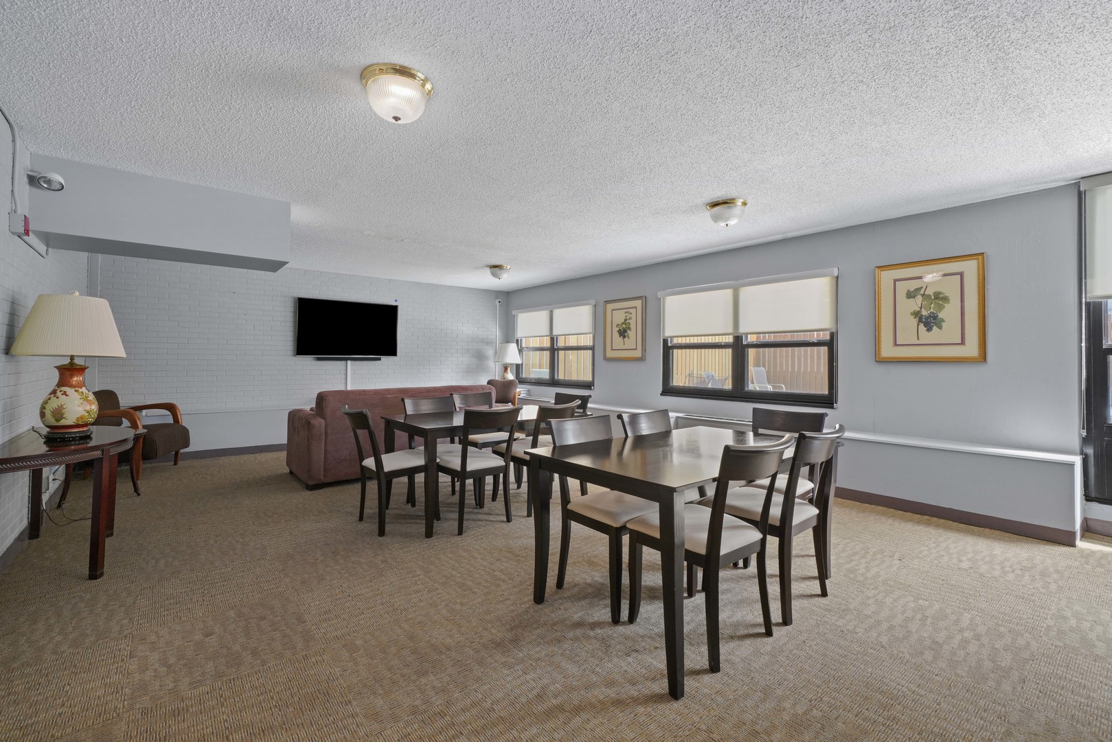 1313 North Ritchie Court, Unit 805 Chicago, IL 60610 - Photo 14 of 21 a view of a dining room with furniture and chandelier