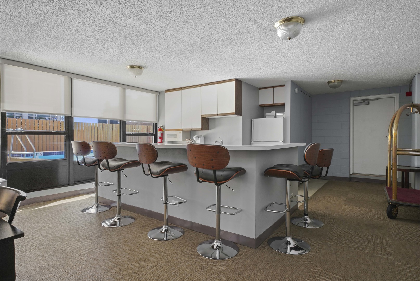 1313 North Ritchie Court, Unit 805 Chicago, IL 60610 - Photo 15 of 21 a view of a livingroom with lounge chair and a large window