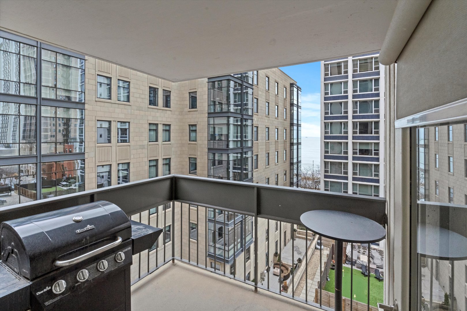 1313 North Ritchie Court, Unit 805 Chicago, IL 60610 - Photo 8 of 21 a view of a balcony with chairs