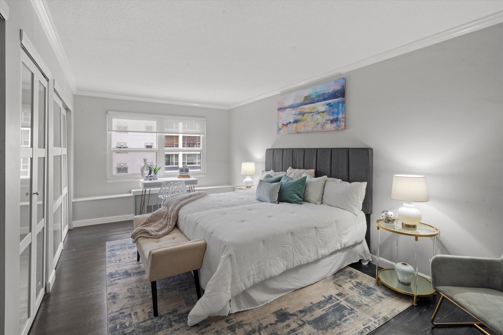 1313 North Ritchie Court, Unit 805 Chicago, IL 60610 - Photo 10 of 21 a bedroom with a bed and wooden floor