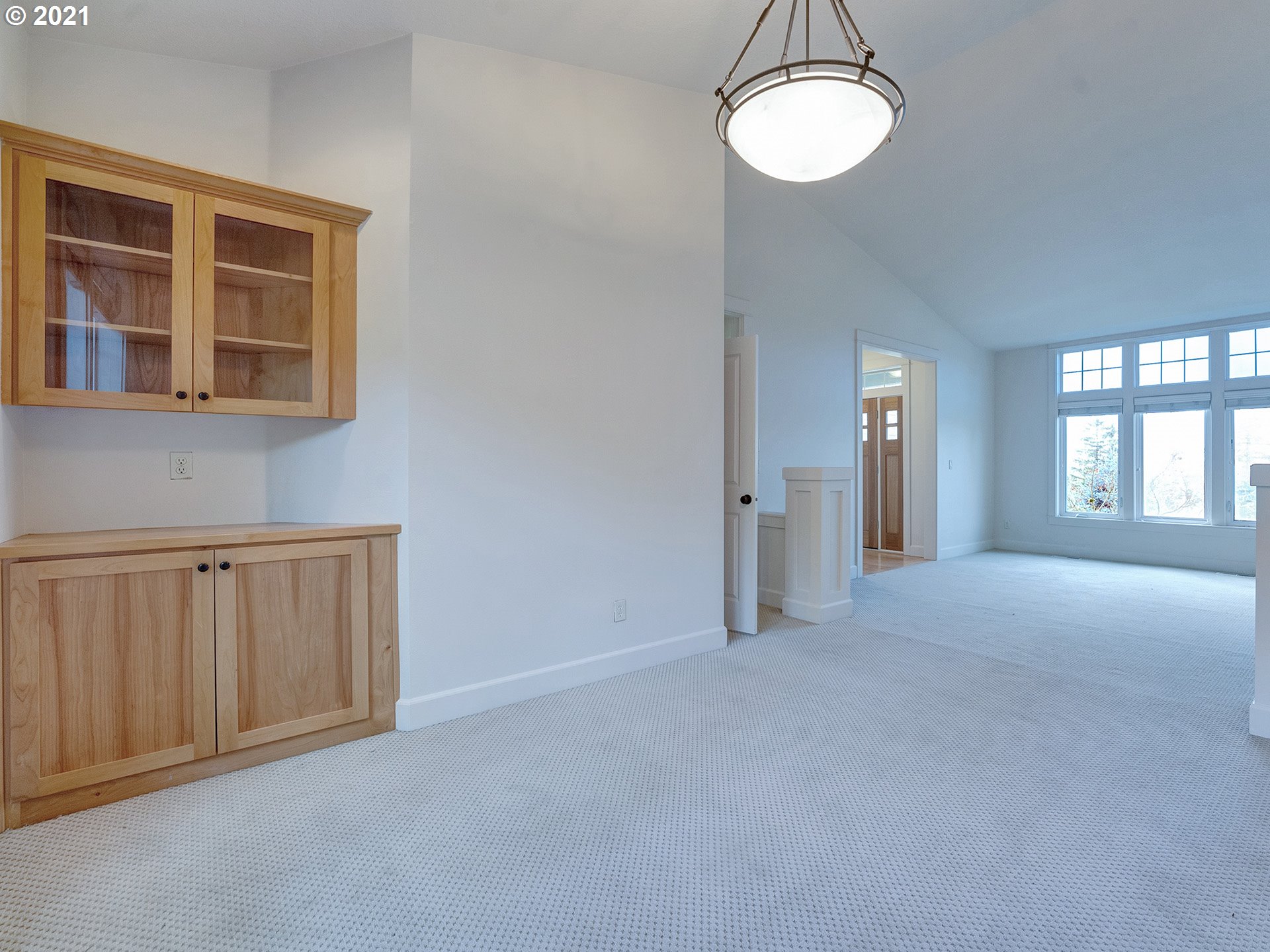10248 Southeast Nicole Loop Happy Valley, OR 97086 - Photo 17 of 32 a view of an empty room with a window
