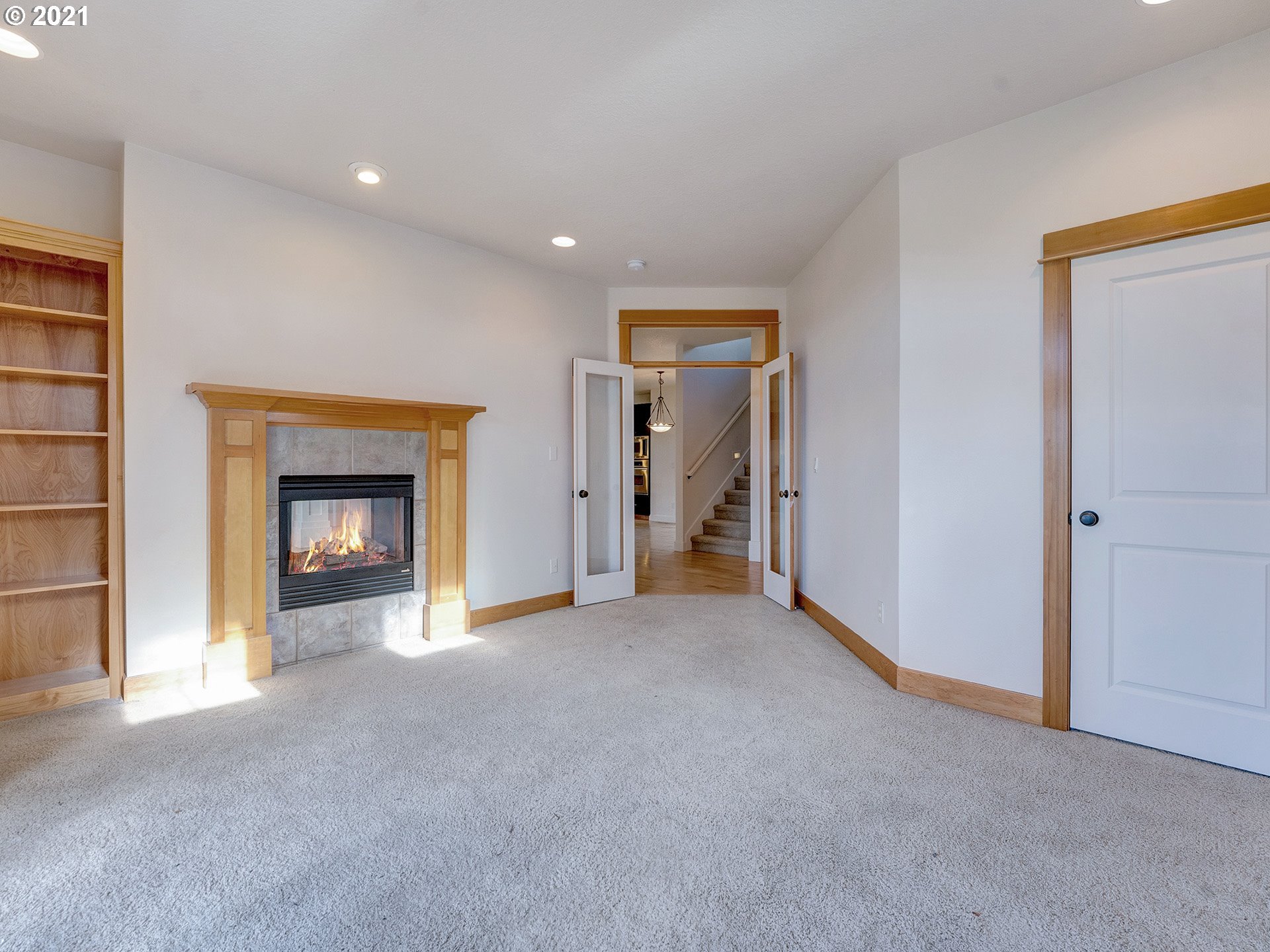 10248 Southeast Nicole Loop Happy Valley, OR 97086 - Photo 20 of 32 a view of empty room with a fireplace