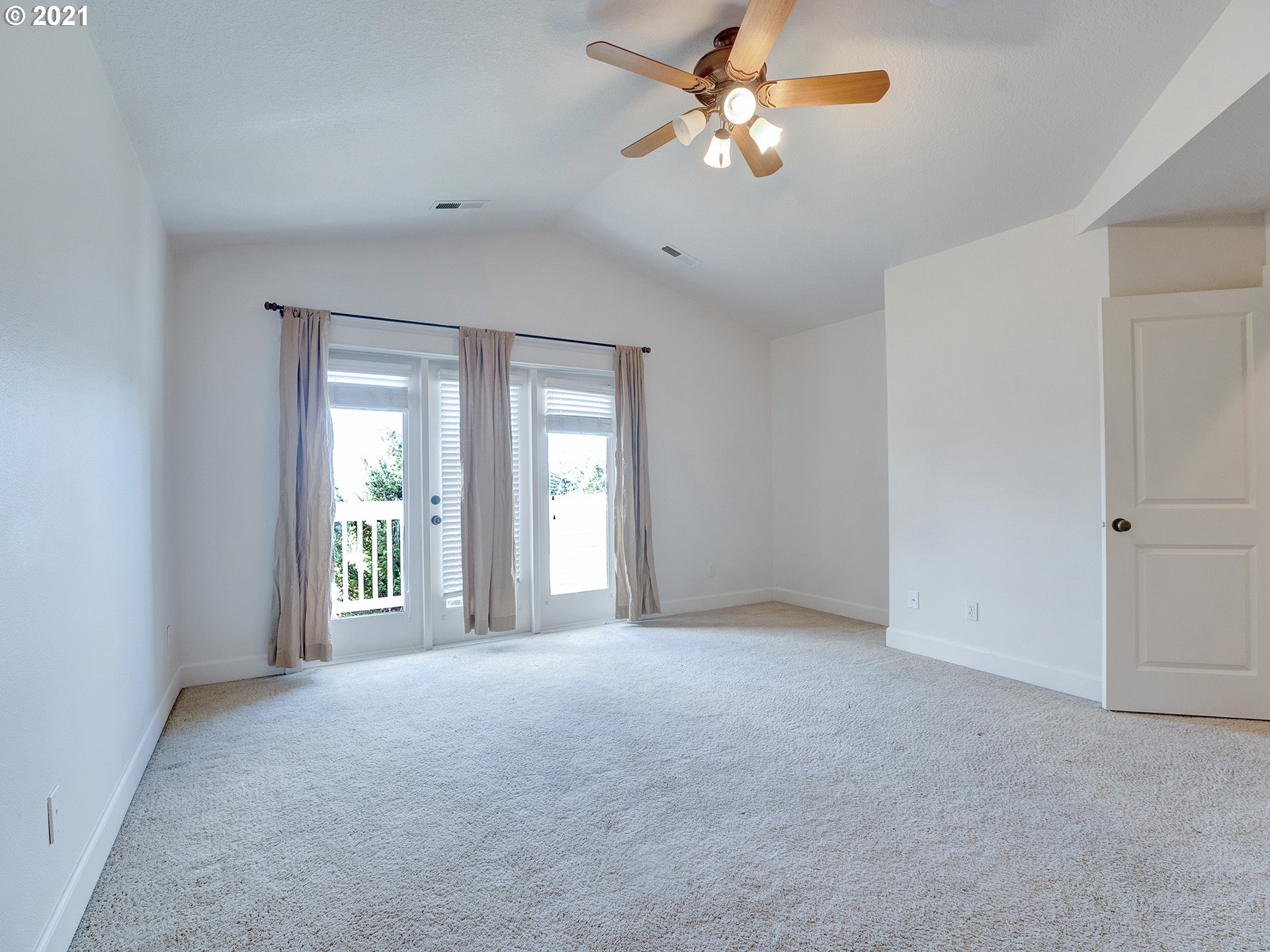 10248 Southeast Nicole Loop Happy Valley, OR 97086 - Photo 22 of 32 a view of an empty room with a window